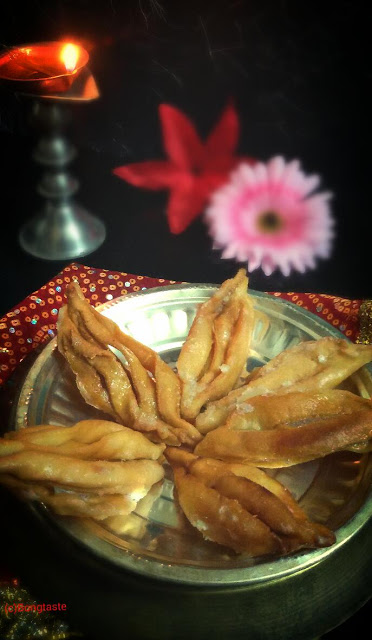 Alo Jhelo (Sugar Coated Indian Pastry)