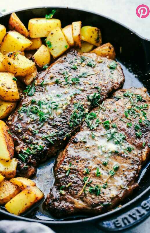 SKILLET GARLIC BUTTER HERB STEAK AND POTATOES