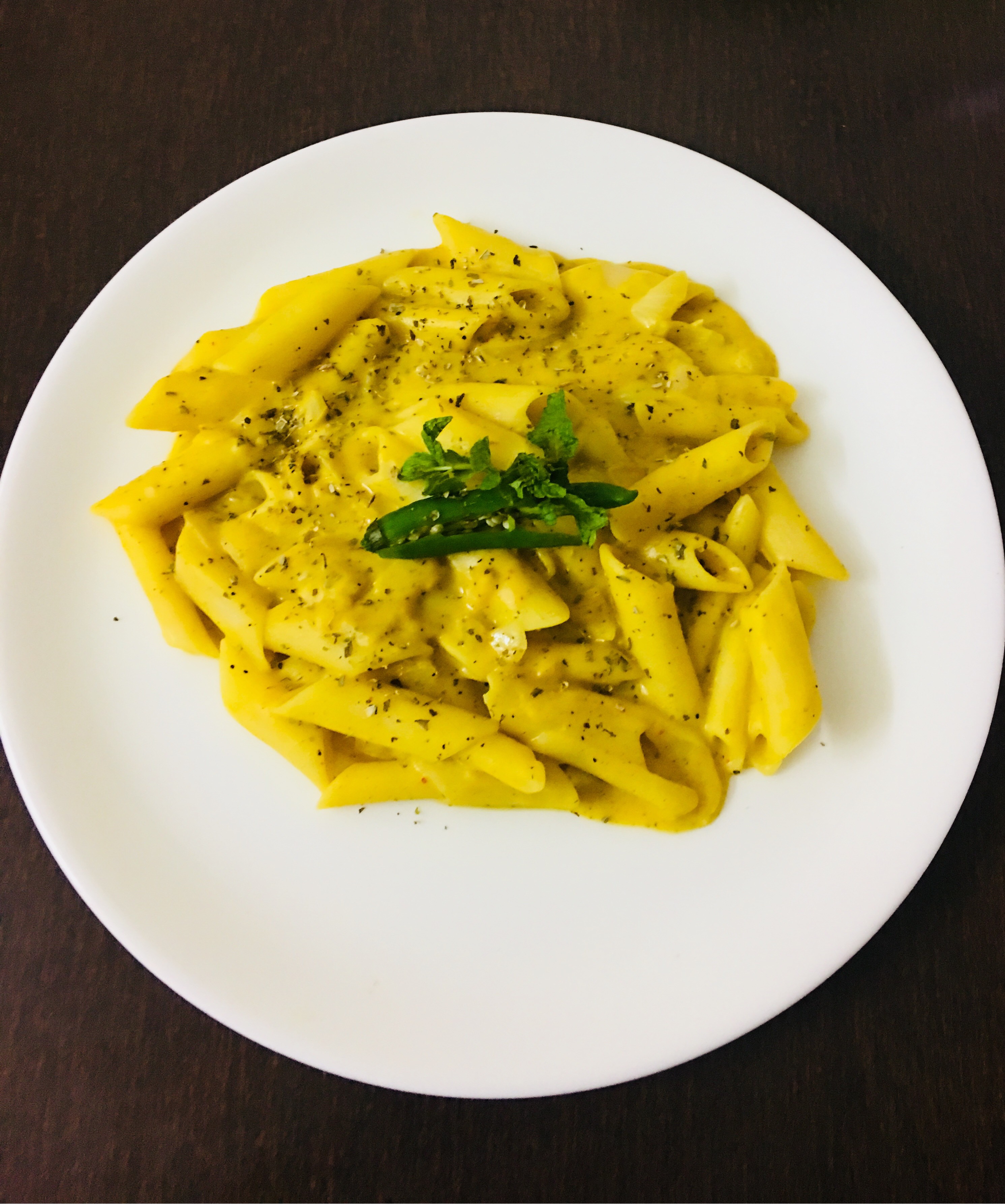 penne pasta in yellow lentils ( arhar daal ) sauce 