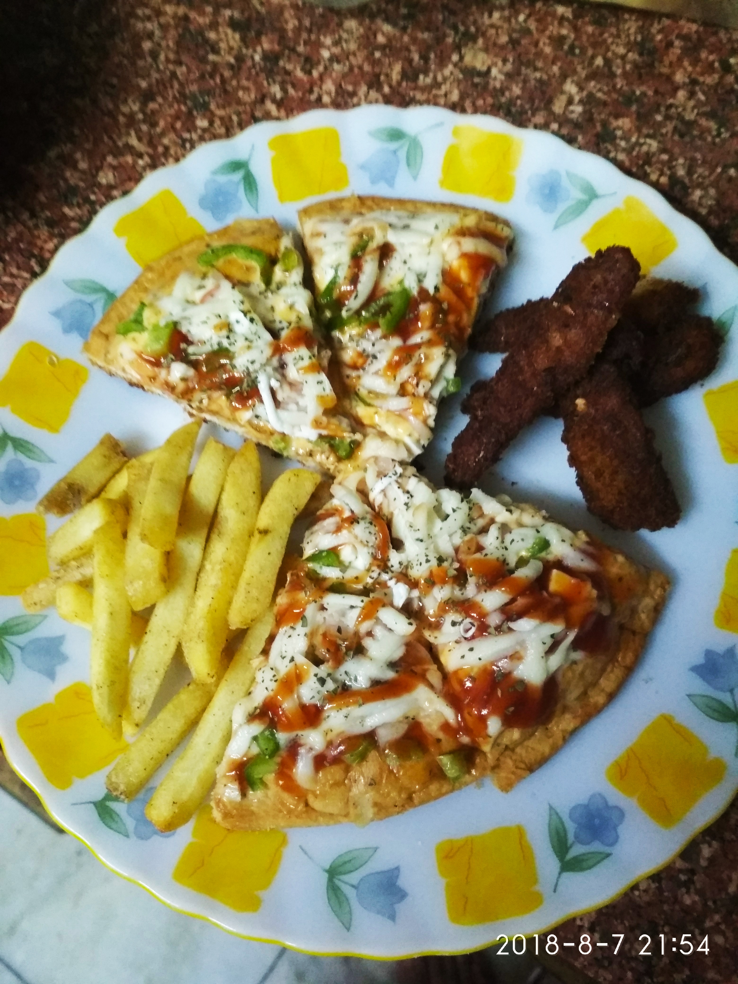 Cheesy pizza with some fish and finger feies