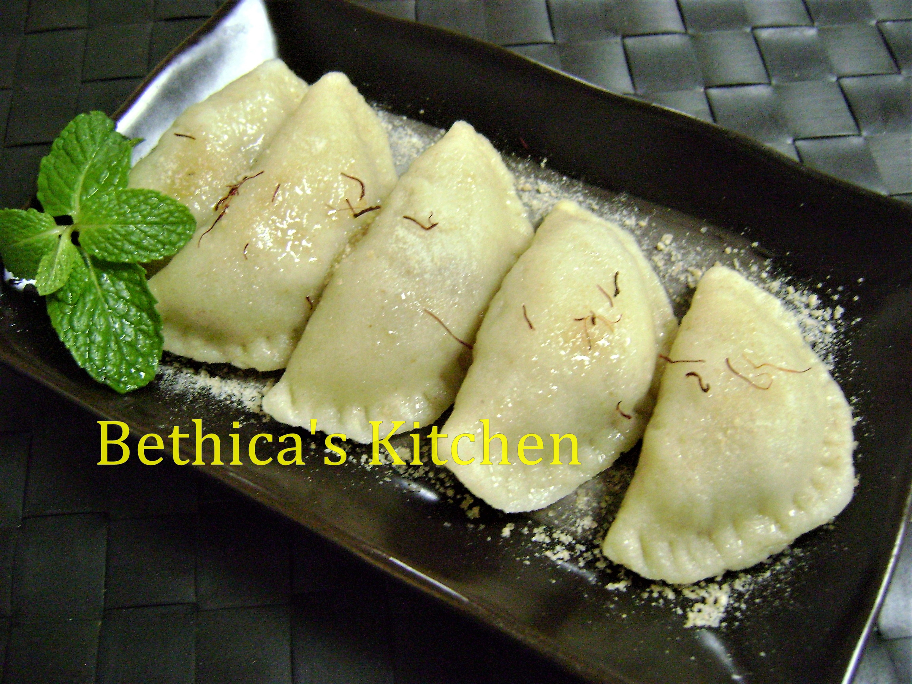 Bhapa Puli Pithe (Steamed & Stuffed Rice Dumplings - Bengali Festive Dessert)