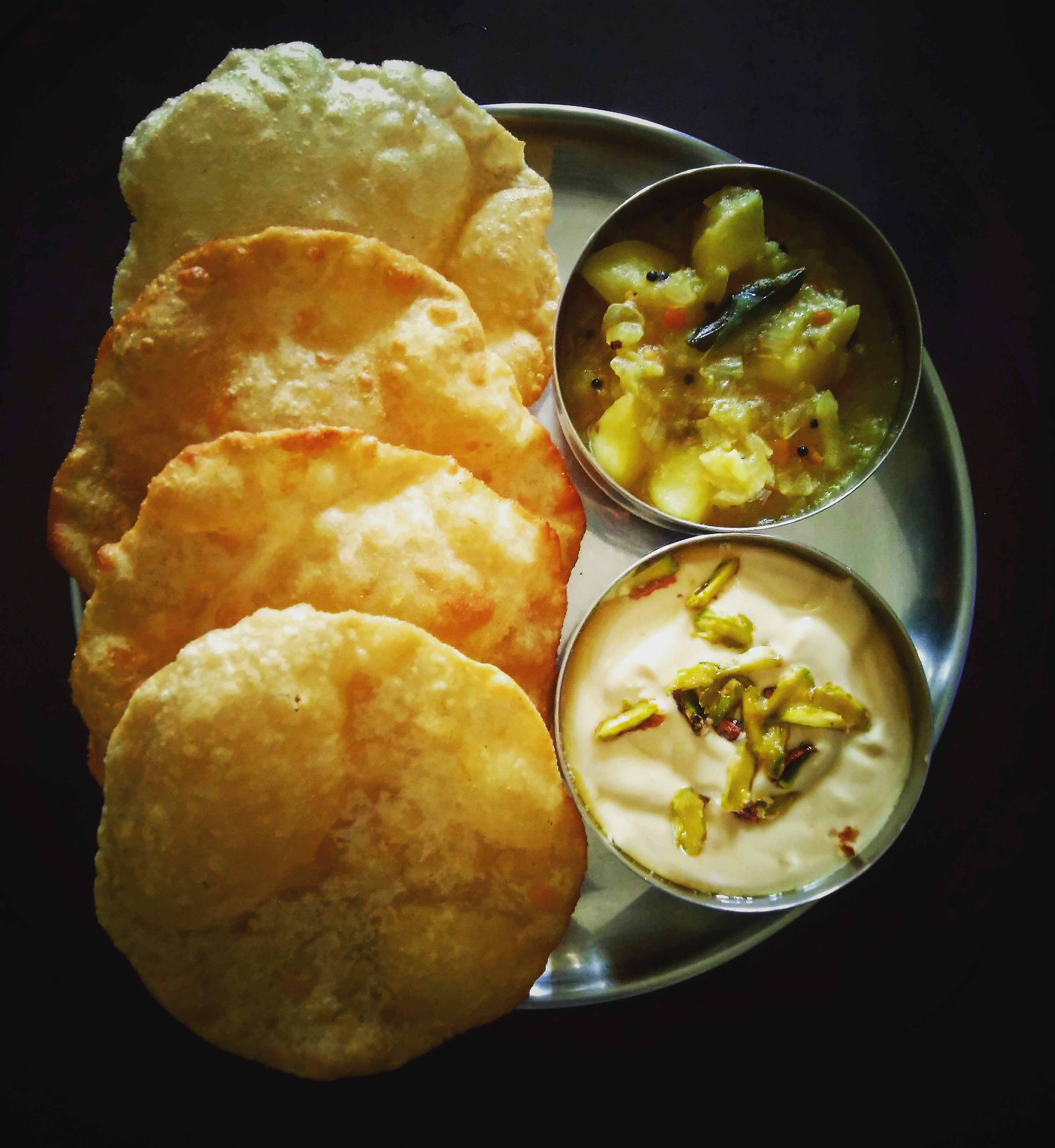 Poori with potato masala and shrikhand
