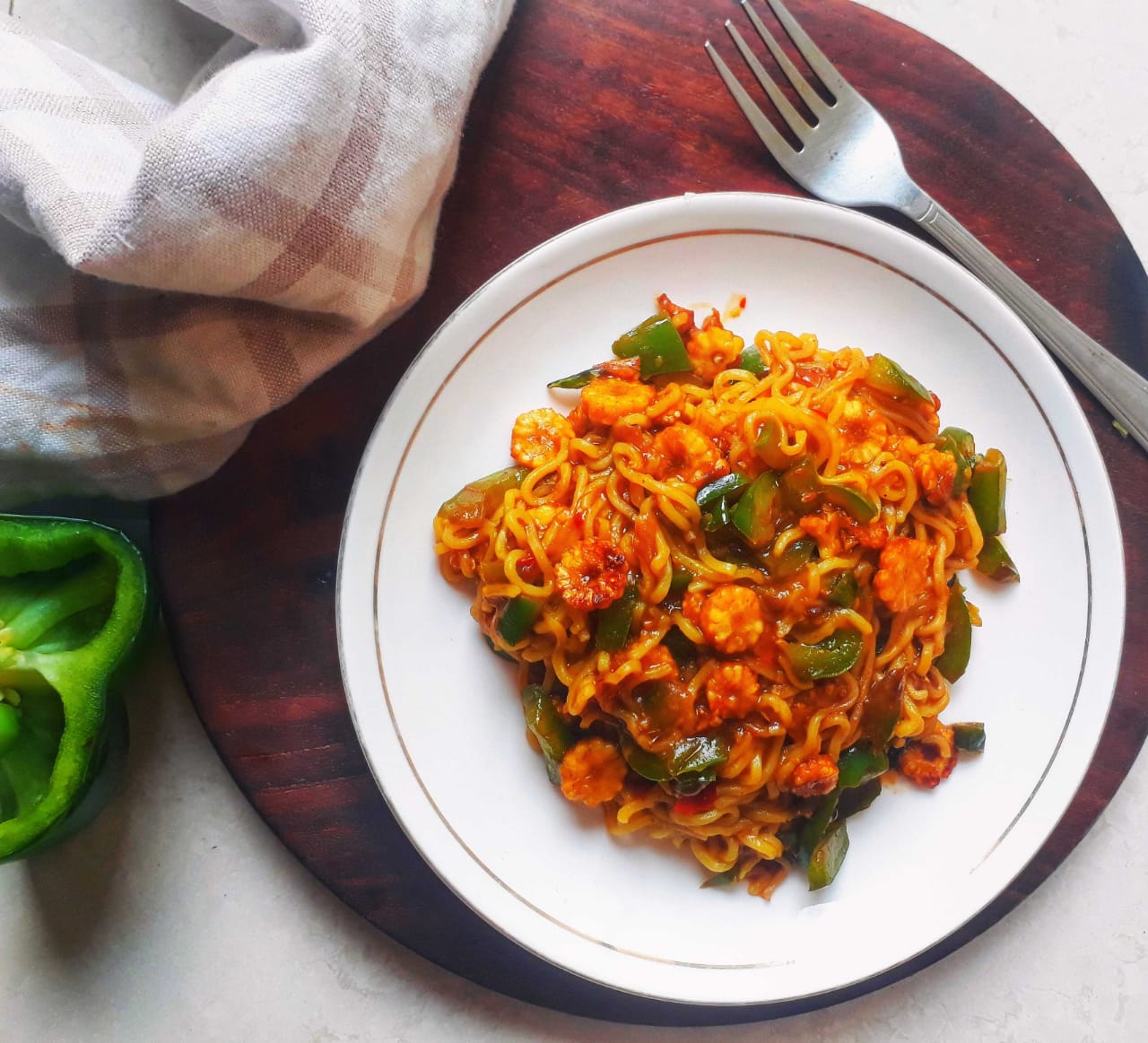 Schezwan Babycorn And Capsicum Noodles