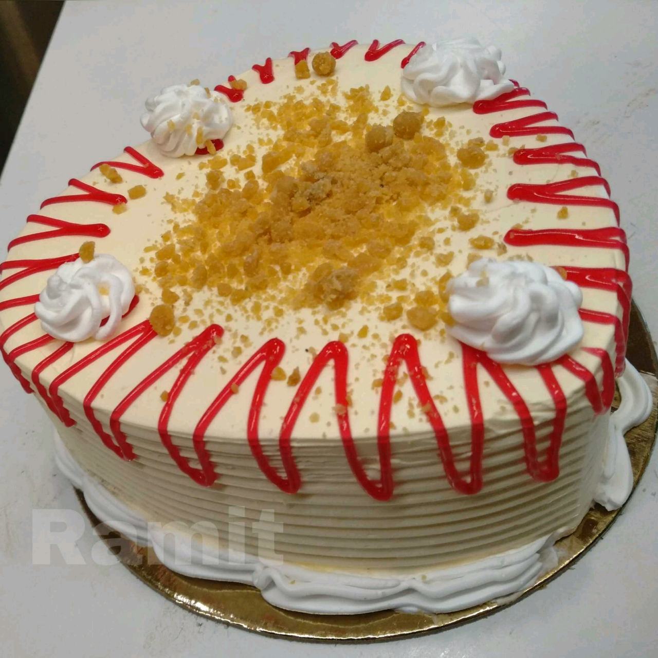 Caramel Crunch Cake Topped With Strawberry Jelly